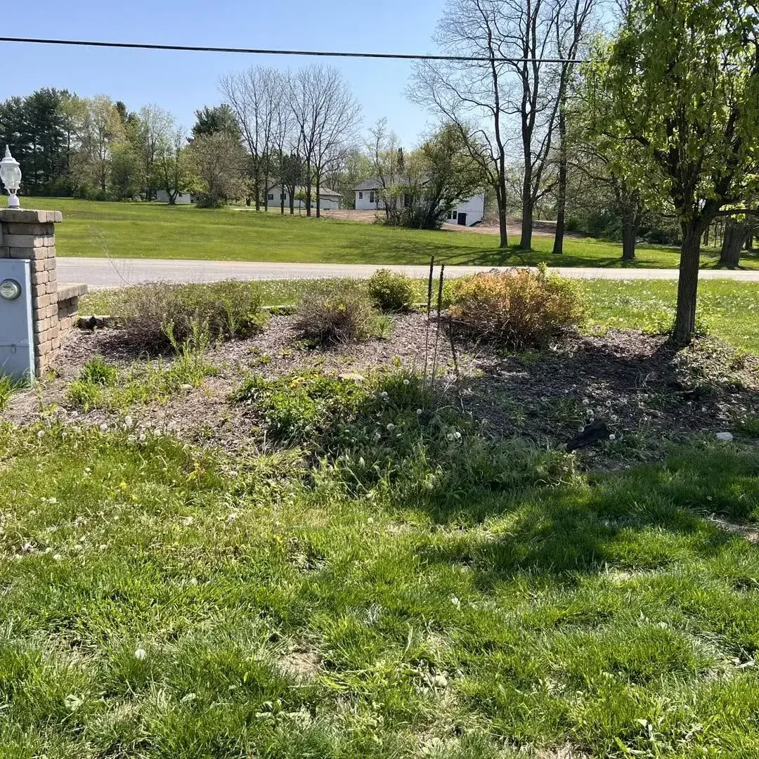 Community entrance landscape bed before finishing work